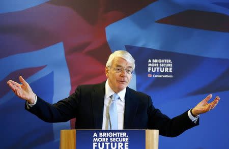 Britain's former Conservative Prime Minister John Major makes a campaign speech at a sports club in Solihull, central England, April 21, 2015. REUTERS/Darren Staples