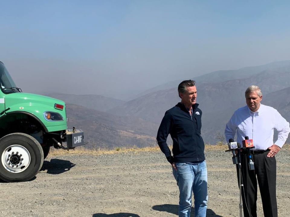 California Gov. Gavin Newsom and Secretary of Agriculture Tom Vilsack in Glenn County on Wednesday, Aug. 4, 2021, to discuss stepped-up efforts to spot and fight fires on Forest Service land.