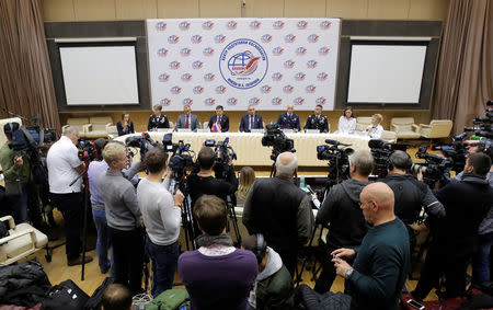 Participants, including crew members of the International Space Station (ISS) next mission David Saint-Jacques of Canada, Oleg Kononenko of Russia and Anne McClain of the U.S., attend a news conference in Star City near Moscow, Russia November 15, 2018. REUTERS/Maxim Shemetov