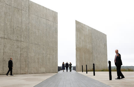 U.S. President Donald Trump and first lady Melania Trump walk with park superintendent Stephen Clark at the Flight 93 National Memorial during the 17th annual September 11 observance at the memorial near Shanksville, Pennsylvania, U.S., September 11, 2018. REUTERS/Kevin Lamarque