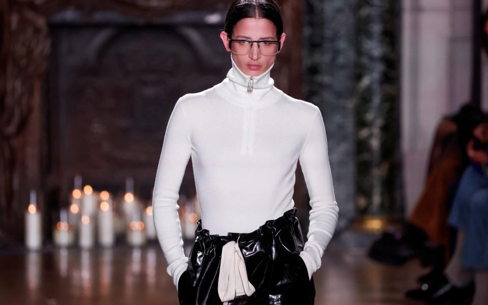 A model presents a creation by designer Victoria Beckham as part of her Fall-Winter 2024/2025 Women's ready-to-wear collection show during Paris Fashion Week, in Paris, France, March 1, 2024. REUTERS/Gonzalo Fuentes