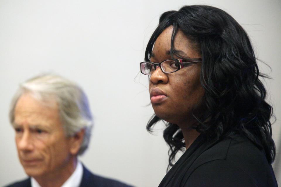 FILE - In this Oct. 24, 2012 file photo, Jessica Tata, accused in the deaths of four children at her west Houston daycare, stands at the conclusion of opening statements at the Harris County Criminal Courthouse, in Houston. Some parents took great care in vetting a list of state-licensed day care providers before leaving their children in the hands of Tata. As Tata’s murder trial plays out, child care experts say that while the state has taken steps to improve regulation of home day care centers, Texas is among many states lagging behind what advocates believe should be the standard for keeping tabs on the centers.(AP Photo/Houston Chronicle, Mayra Beltran, File) NO SALES; MANDATORY CREDIT; MAGS OUT; TV OUT