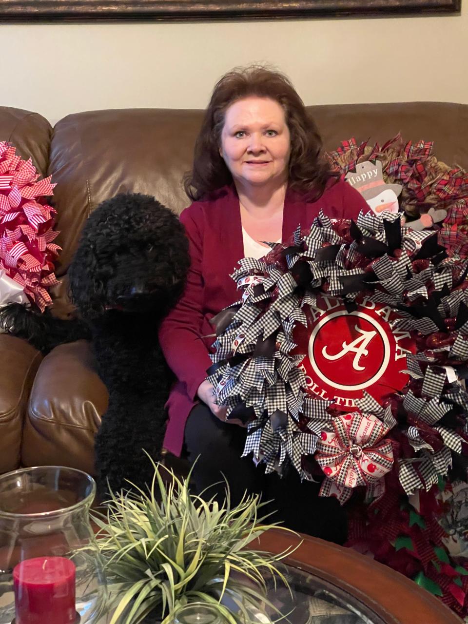 “You’d think, with where we were, Tennessee would be more popular. But for some reason, people want Alabama," says Lisa Perry Lynch of this wreath.