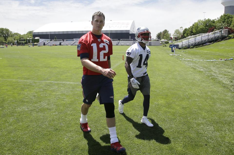 Summer chemistry class: new Patriots WR Brandin Cooks (right) has to learn how to work well with Tom Brady. (AP)