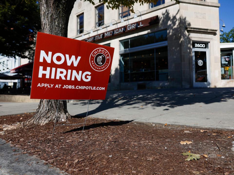 Now hiring sign outside Chipotle restaurant