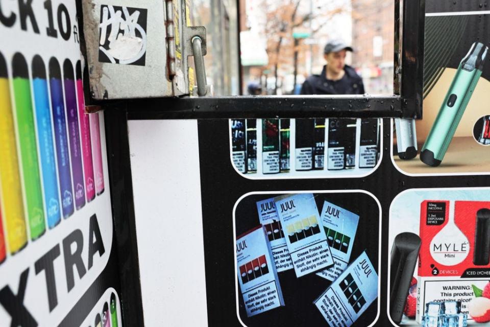 A Juul advertisement is seen on a grocery store on Flatbush Avenue on Dec. 7, 2022, in the Flatbush neighborhood of Brooklyn borough in New York City. Juul Labs announced that it has agreed to settle about 5,000 lawsuits in a northern California court case for an undisclosed amount settling a legal battle over the company's sale and marketing of e-cigarettes that has been blamed for the teenage vaping crisis.