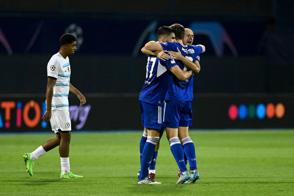 Dinamo Zagreb players celebrate after winning the UEFA Champions League Group E football match between Dinamo Zagreb (CRO) and Chelsea (ENG) at The Maksimir Stadium in Zagreb on September 6, 2022. (Photo by DENIS LOVROVIC / AFP) (Photo by DENIS LOVROVIC/AFP via Getty Images)