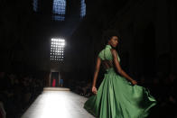 A model wears a creation for the Julien Fournie Spring/Summer 2019 Haute Couture fashion collection presented in Paris, Tuesday Jan. 22, 2019. (AP Photo/Thibault Camus)