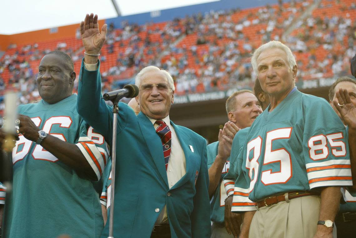 FOR SPORTS-- PHOTO BY C.W. Griffin- MIAMI HERALD STAFF -12/16/07--The Miami Dolphins play the Baltimore Ravens in Dolphin Stadium Larry Little,Don Schula and Nick Buoniconti take in the honor celebration for the Perfect Season.-Photo by C.W. Griffin/Miami Herald Staff