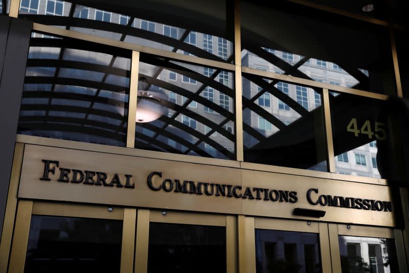 FILE PHOTO: Signage is seen at the headquarters of the Federal Communications Commission in Washington, D.C.