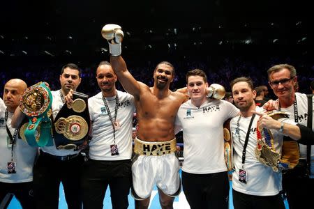 Boxing - David Haye v Mark de Mori - The O2 Arena, London - 16/1/16 David Haye celebrates his win with trainer Shane McGuigan and team Action Images via Reuters / Andrew Couldridge Livepic EDITORIAL USE ONLY.