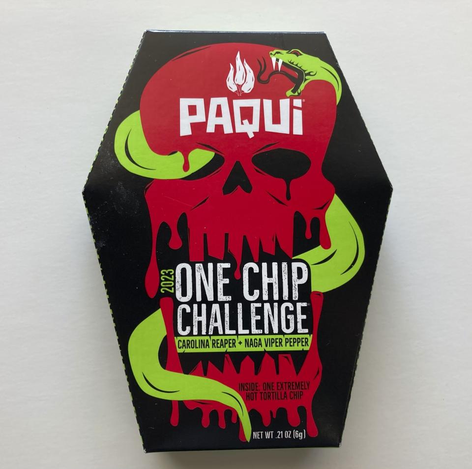 A package of Paqui OneChipChallenge spicy tortilla chips is seen on Thursday, Sept. 7, 2023, in Boston. Authorities are raising the alarm about a OneChipChallenge social media trend that encourages people to avoid seeking relief from eating and drinking for as long as possible after eating the chips, days after a Massachusetts teenager died hours after taking part in the challenge. | Steve LeBlanc, Associated Press
