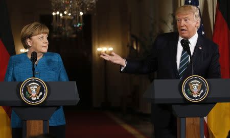 U.S. President Donald Trump speaks as he holds a joint news conference with German Chancellor Angela Merkel in the East Room of the White House in Washington, U.S., March 17, 2017. REUTERS/Jim Bourg