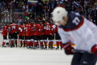 Team Canada celebrates after beating the USA 1-0 in a men's semifinal ice hockey game at the 2014 Winter Olympics, Friday, Feb. 21, 2014, in Sochi, Russia. (AP Photo/Petr David Josek)