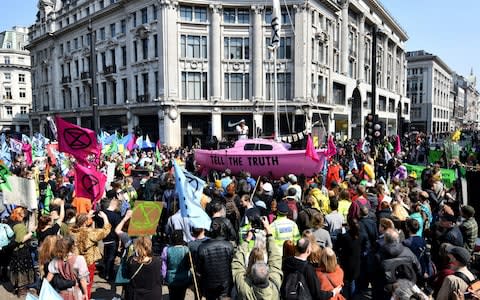 London's protests are part of a wider campaign which will see people in at least 80 cities in more than 33 countries - Credit: Leon Neal/Getty Images