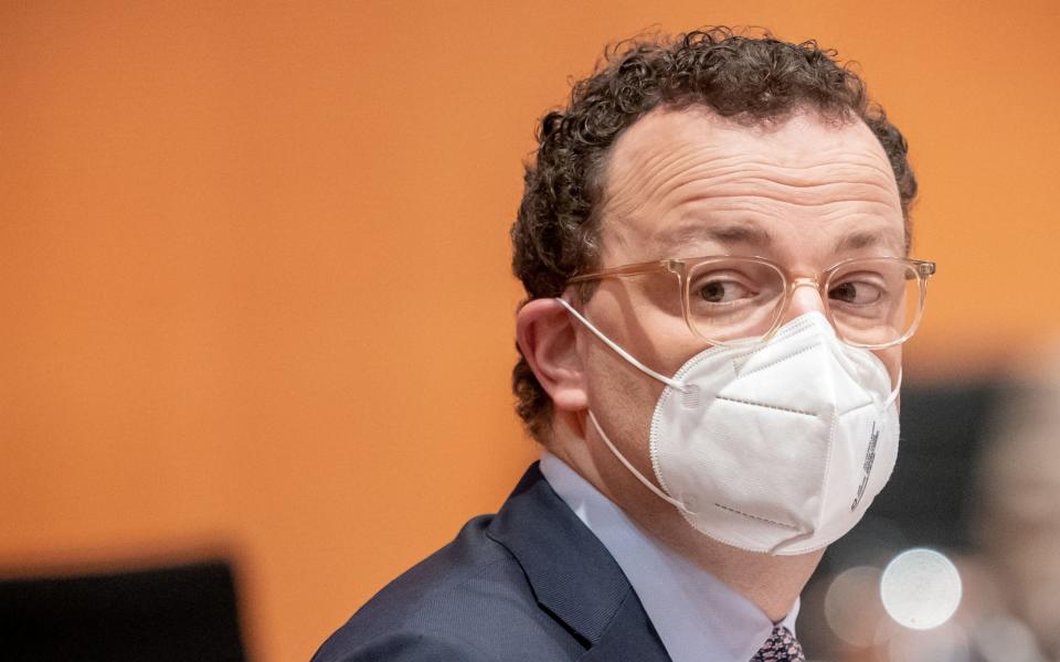 German Health Minister Jens Spahn wears a protective face mask as he arrives for the weekly cabinet meeting of the German government at the chancellery in Berlin, Germany, March 3, 2021. Michael Kappeler/Pool via REUTERS - MICHAEL KAPPELER/ via REUTERS