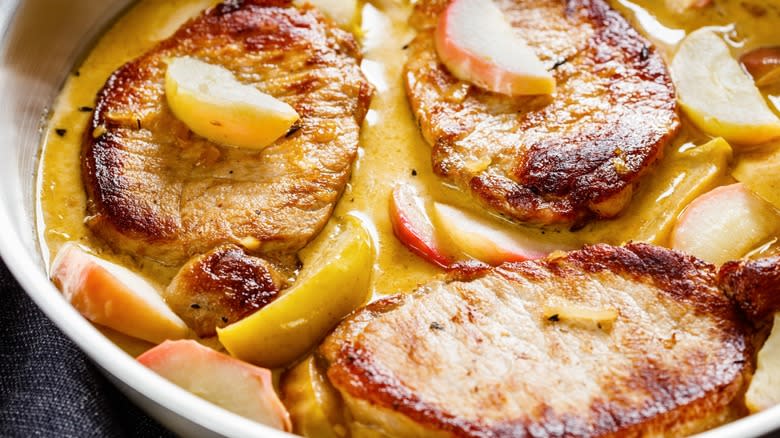 Pork cooked with apples and whiskey