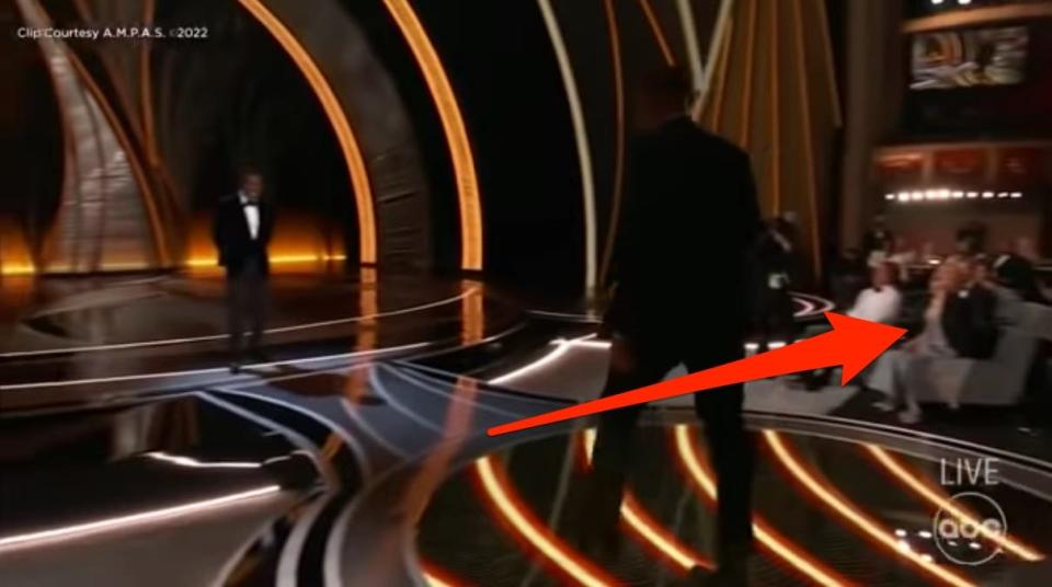 footage from the event shows nicole kidman off to the side of the oscars stage as will smith approaches chris rock. she's wearing keith urban's black suit jacket