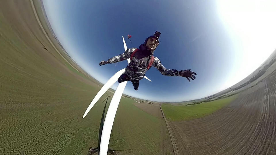 A daring BASE jumper performed a perfect 'low level' stunt from a wind turbine but ended up face-planting the ground after he literally ploughed into a field. Kevin Marret, 28, had a lucky escape - with only his ego bruised - after the less than stellar landing after leaping off the 280ft turbine in the Midi- Pyrenees. The beautiful footage starts out well as Kevin jumps and freefalls for a moment before pulling his shoot. But he opened his chute a fraction of a second too late and, due to excessive forward momentum, ate dirt. Luckily Kevin was uninjured hurt and can see the funny side of the whole affair. Kevin, from Paris, France, said: “I was visiting the location for Base jumping. I performed my chute pull too low, plus it was a bit windy. I need less delay before I pull next time.”