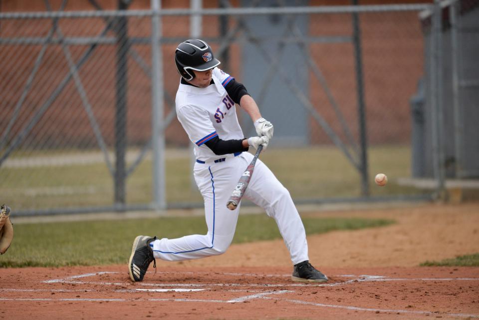 St. Cloud's Jaden Mendel watches the ball connect on the bat at the plate as ROCORI hosts St. Cloud for a conference game on Tuesday, April 19, 2022, at Cold Spring Baseball Park. 