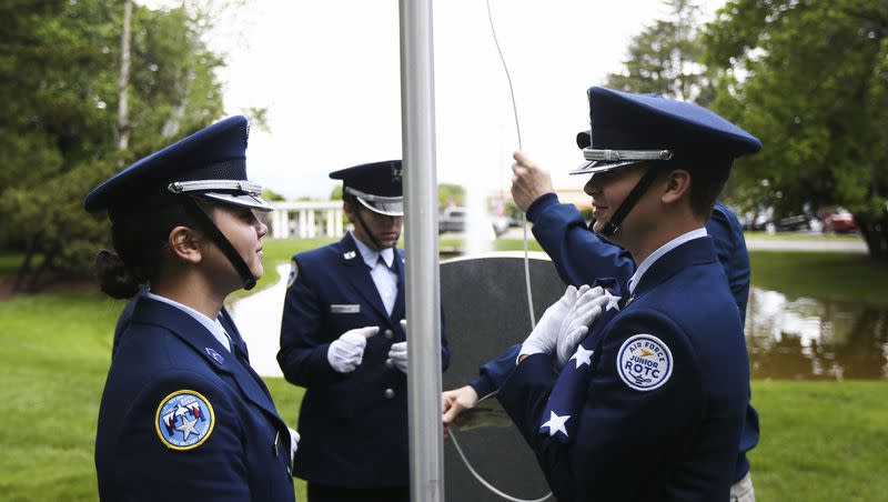 Members of the Utah Military Academy prepare to raise the flag during a Memorial Day ceremony at Wasatch Lawn Memorial Park in Salt Lake City on Monday, May 27, 2019.