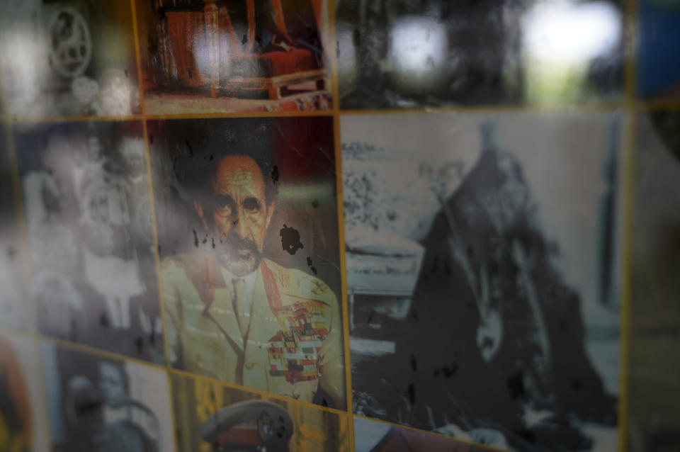 Photos of Haile Selassie I, the late Ethiopian emperor whom most Rastafari worship as their savior, hang on the walls of the Ras Freeman Foundation for the Unification of Rastafari tabernacle on Saturday, May 13, 2023, in Liberta, Antigua. (AP Photo/Jessie Wardarski)