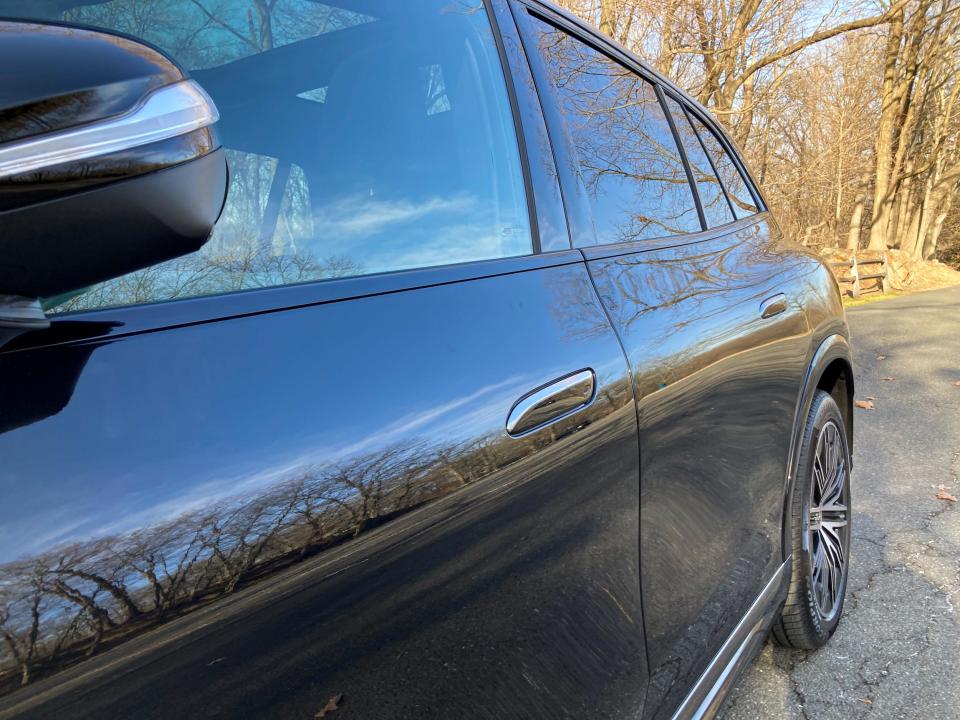 The 2023 Mercedes-Benz EQS SUV's flush door handles in their retracted position.