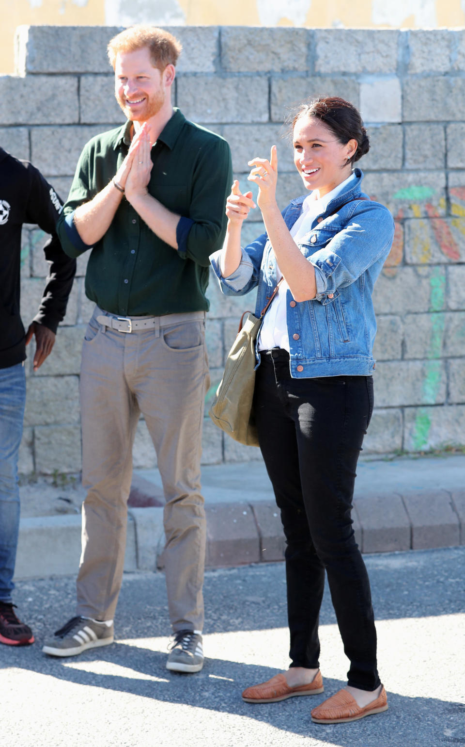 Britain's Prince Harry and Meghan, Duchess of Sussex visit Waves for Change, an NGO supporting local surf mentors to provide mental health services to vulnerable young people living in under resourced communities at Monwabisi Beach, in Cape Town, South Africa September 24, 2019. Chris Jackson/Pool via REUTERS