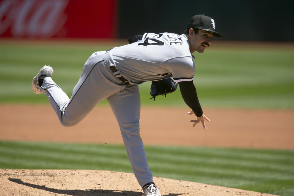 Chicago White Sox starting pitcher Dylan Cease delivers against the Oakland Athletics during the first inning of a baseball game, Saturday, July 1, 2023, in Oakland, Calif. (AP Photo/D. Ross Cameron)