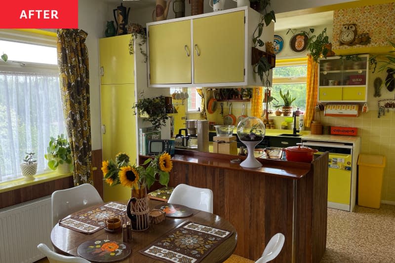 Retro yellow kitchen after renovation.