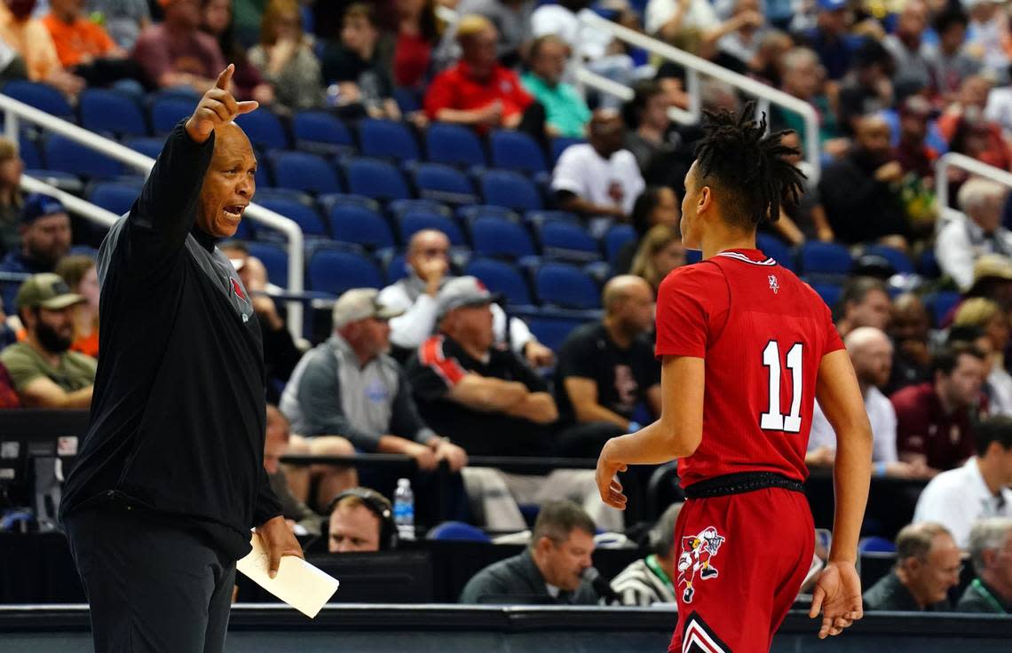 Mar 7, 2023; Greensboro, NC, USA; Louisville Cardinals head coach Kenny Payne instructs Louisville Cardinals guard Fabio Basili (11) against the Boston College Eagles during the first half of the first round of the ACC tournament at Greensboro Coliseum.