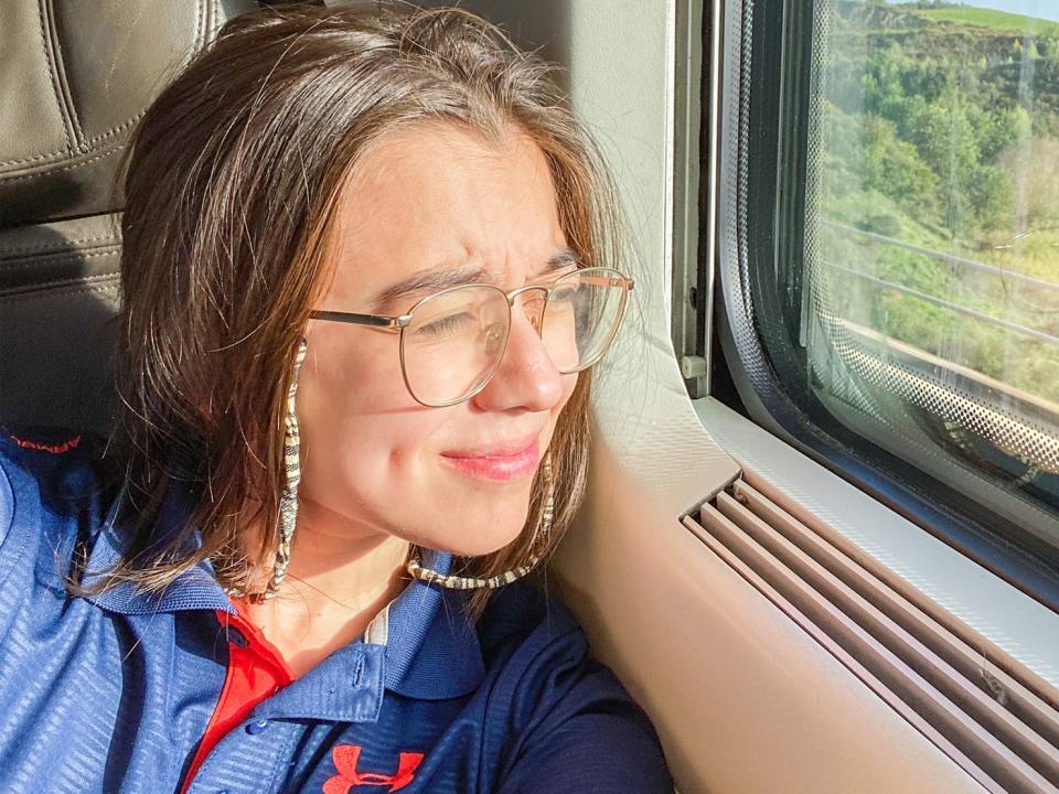 The author enjoys a business-class ride on a Trenitalia train in Italy.