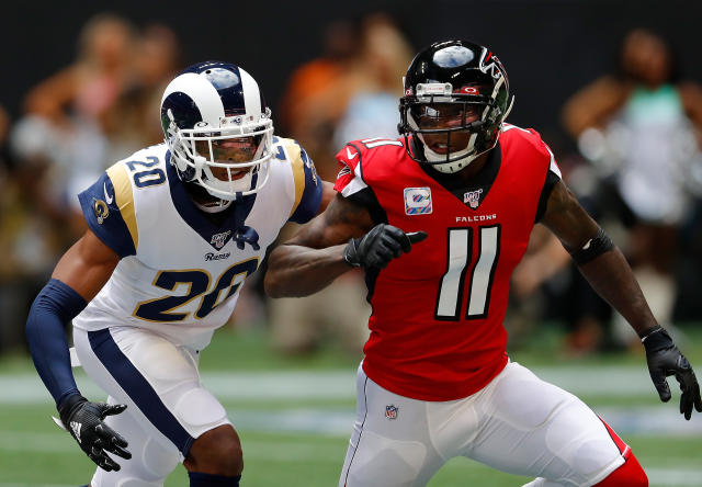 Los Angeles Rams cornerback Jalen Ramsey (5) grabs the jersey of Carolina  Panthers quarterback PJ Walker (11) for a sack during an NFL football game  Sunday, Oct. 16, 2022, in Inglewood, Calif. (