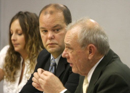 Lawyer James Reich makes a point during a hearing
