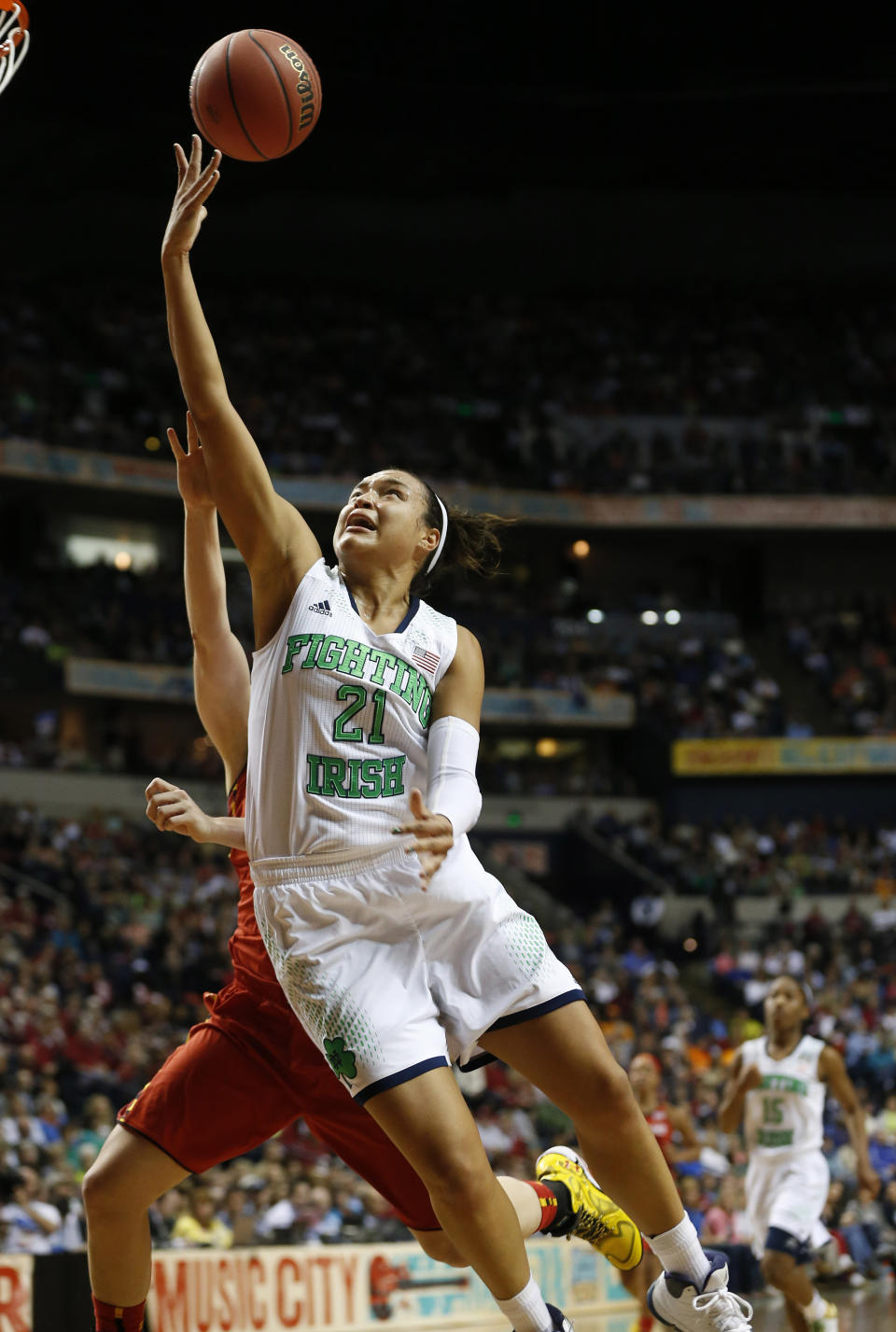 Notre Dame guard Kayla McBride (21) shoots against Maryland during the second half of the championship game in the Final Four of the NCAA women's college basketball tournament, Sunday, April 6, 2014, in Nashville, Tenn. (AP Photo/John Bazemore)