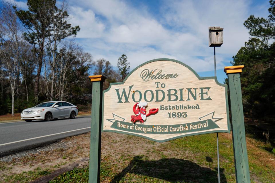 A sign at the city limits of Woodbine, Georgia.