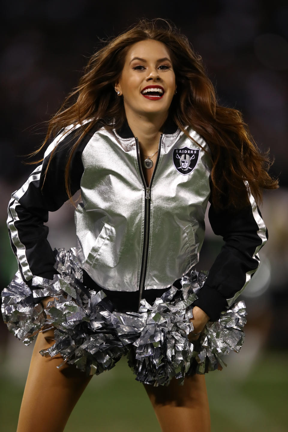 <p>An Oakland Raiders Raiderette performs during their NFL game against the Kansas City Chiefs at Oakland-Alameda County Coliseum on October 19, 2017 in Oakland, California. (Photo by Ezra Shaw/Getty Images) </p>