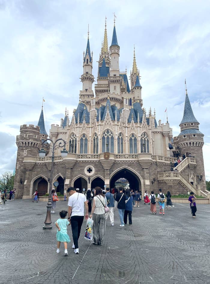 People walking towards Cinderella Castle at Disney's Magic Kingdom