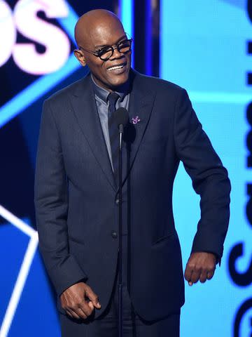 <p>Kevin Winter/BET/Getty</p> Samuel L. Jackson accepts the Lifetime Achievement Award onstage during the 2016 BET Awards