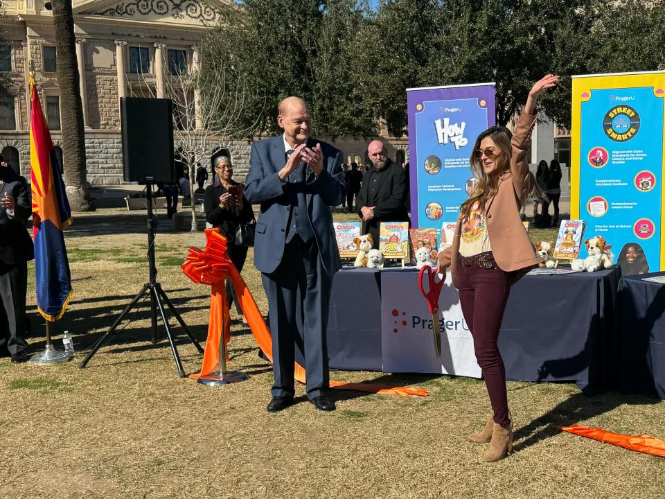 Superintendent of Public Instruction Tom Horne joins PragerU CEO Marissa Streit during a ribbon-cutting ceremony outside the Arizona state Capitol on Jan. 31, 2024.