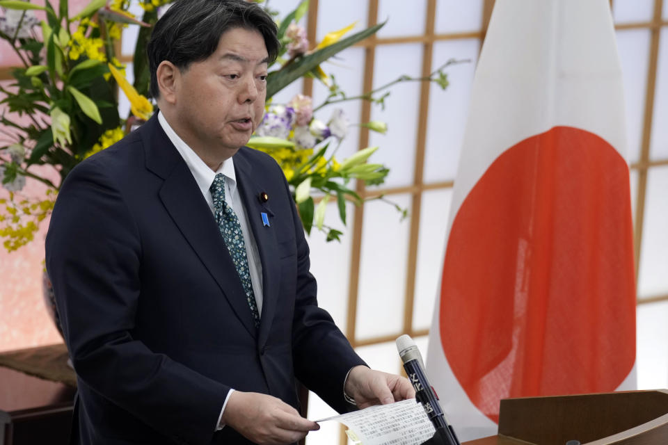 Japanese Foreign Minister Yoshimasa Hayashi speaks to media outlets at his office Monday, March 6, 2023, in Tokyo. South Korea on Monday announced a contentious plan to raise local civilian funds to compensate Koreans who won damages in lawsuits against Japanese companies that enslaved them during World War II. Hayashi told reporters that Japan "appreciates" South Korean announcement and that he hopes political, cultural and economic ties between the two countries would deepen from now on. (AP Photo/Eugene Hoshiko)