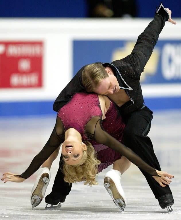 Tatiana Navka and Roman Kostomarov perform at the 2004 World Figure Skating Championships in Dortmund