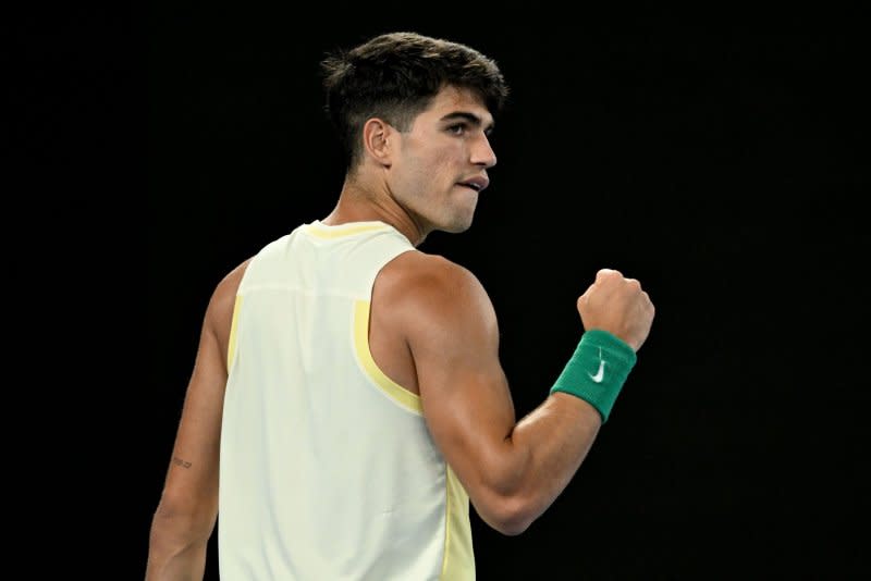 Carlos Alcaraz (pictured Tuesday in Melbourne) of Spain needed just 2 hours, 22 minutes to dispatch unseeded Richard Gasquet of France in the first round of the Australian Open. Photo by Lukas Coch/EPA-EFE