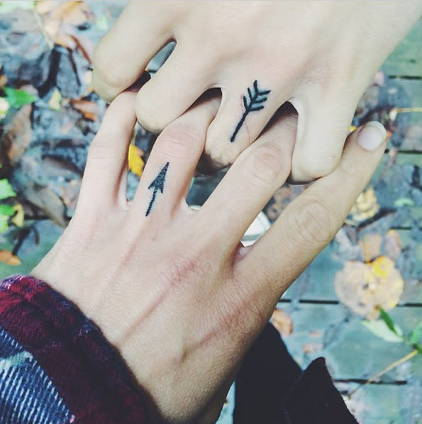 A Person in Plaid Long Sleeves Wearing Engagement Ring while Holding a  Tattooed Person Hand · Free Stock Photo