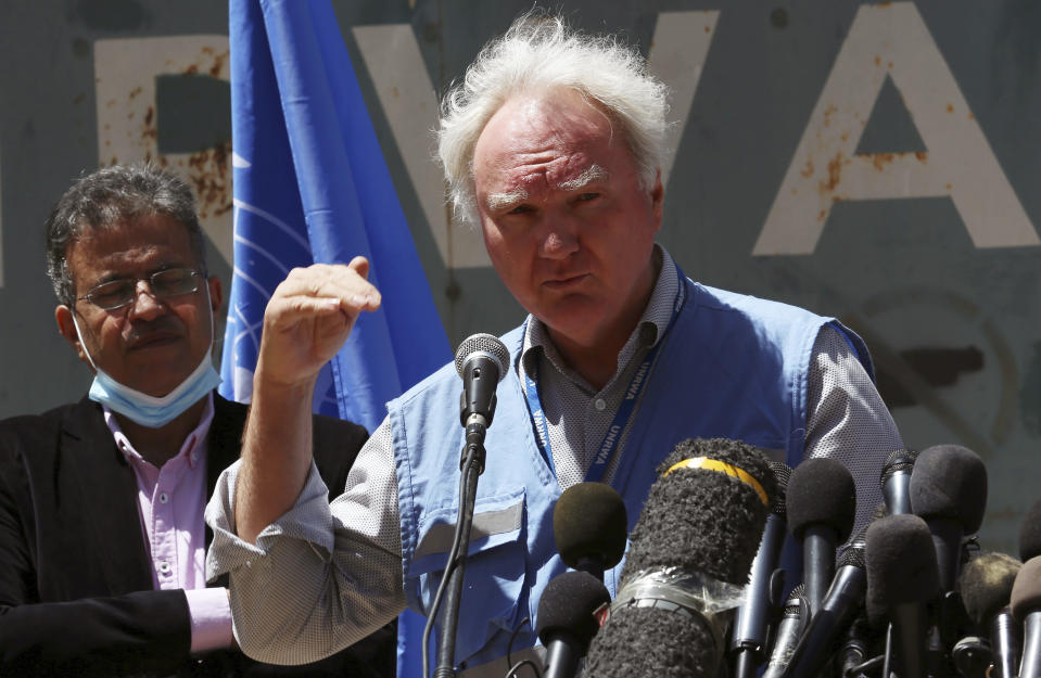 Matthias Schmale, UNRWA's director in Gaza, speaks during a news conference in front of the UNRWA headquarters in Gaza City, Wednesday, May 19, 2021. (AP Photo/Adel Hana)