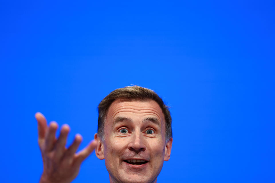 ISA British Chancellor of the Exchequer Jeremy Hunt gestures as he speaks at Britain's Conservative Party's annual conference in Manchester, Britain, October 2, 2023. REUTERS/Hannah McKay