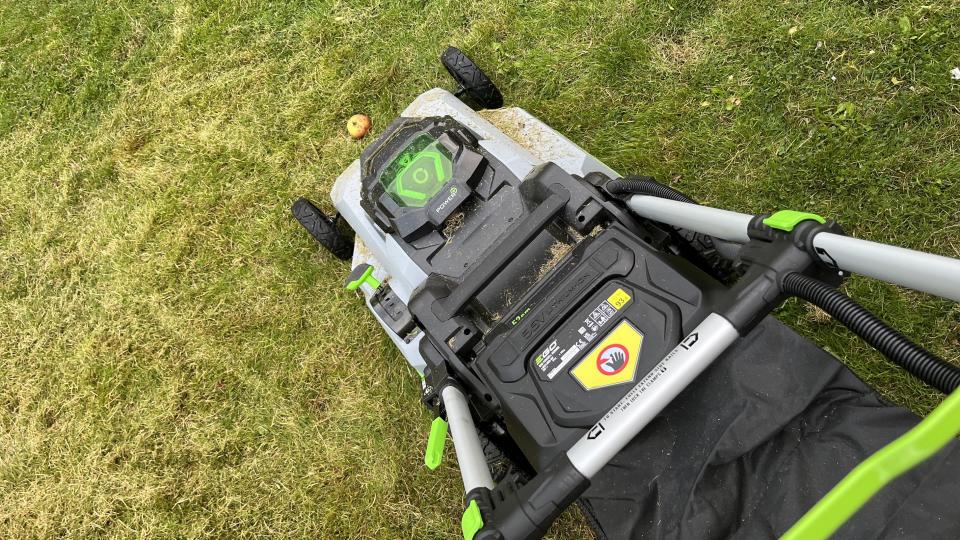 cutting an apple with the ego lawn mower