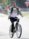 <p>On Saturday in L.A., Wells Adams gets some fresh air during a solo bike ride.</p>