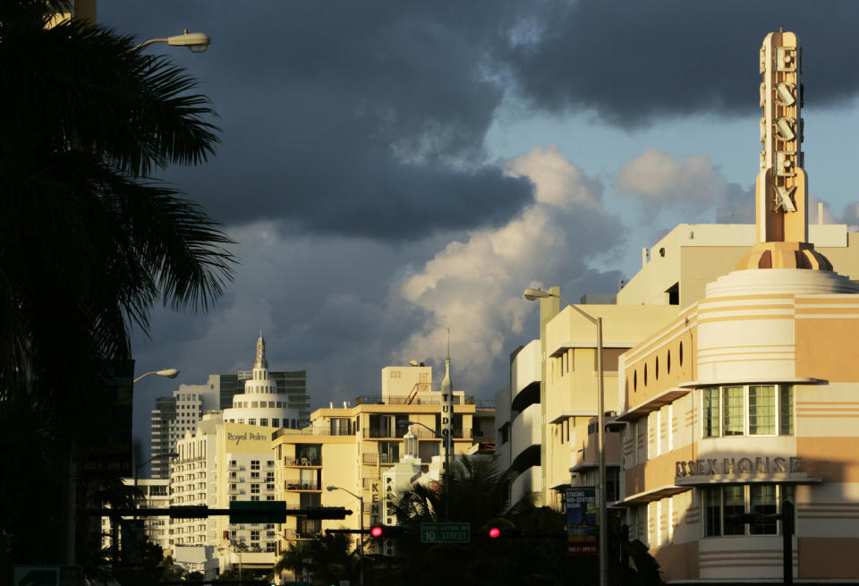 In this Jan. 7, 2008 file photo, Art deco designed buildings line Collins Avenue in Miami Beach, Fla. Modern day South Beach is still a vibrant monument to the art deco designs of the late 1920's and 30's. Walking around Ocean Drive and nearby streets to view the historic architecture is one of the cultural attractions of the city, among other interesting things to see and enjoy for free there. (AP Photo/Lynne Sladky, File)