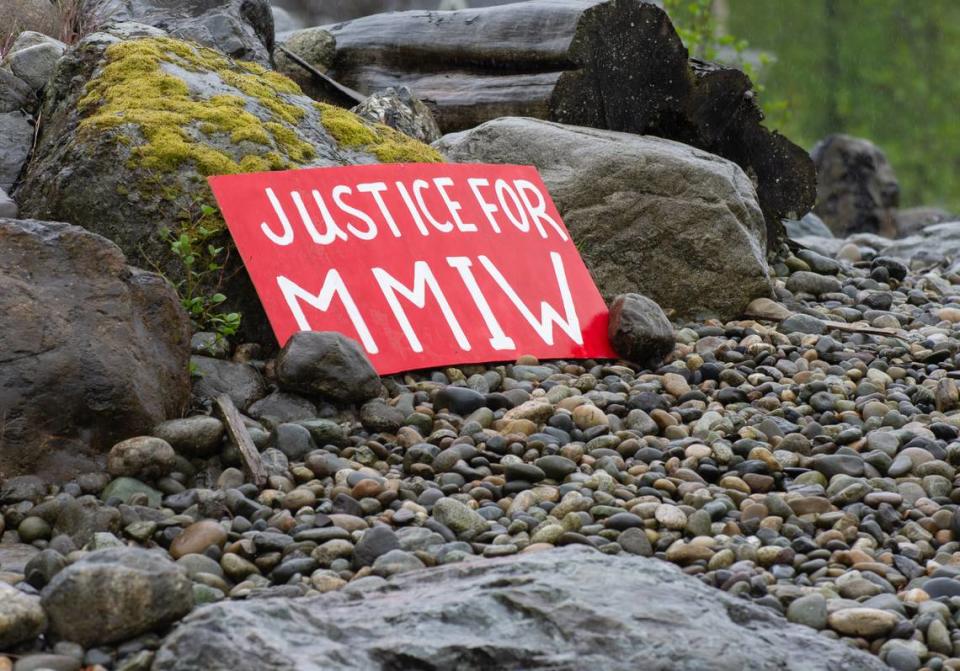 Around the Lummi Nation Reservation near Bellingham, Wash., signs and red dresses, shirts and children’s clothes were hung and placed in honor of missing and murdered Lummi Tribal members and Indigenous people for Missing and Murdered Indigenous Women and People Awareness Day Thursday, May 5, 2022. A sign at the Haxton Way and Kwina Road roundabout sits where about 50 Lummi Tribal and community members gathered to walk in observance of the day. Natasha Brennan/McClatchy